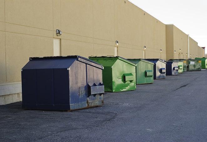 several large trash cans setup for proper construction site cleanup in Bethany, OK